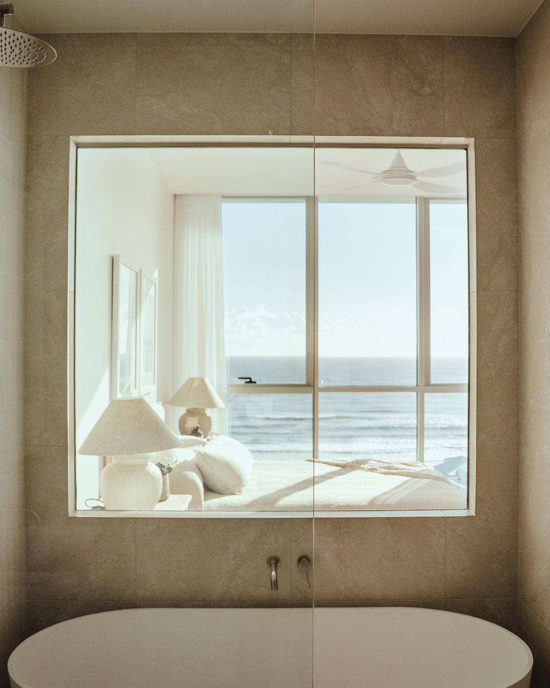 Switchable privacy glass in a bathroom turned on