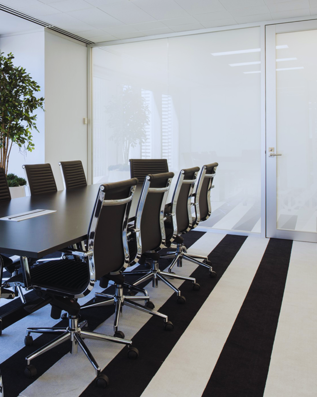 Switch glass in an office boardroom turned off