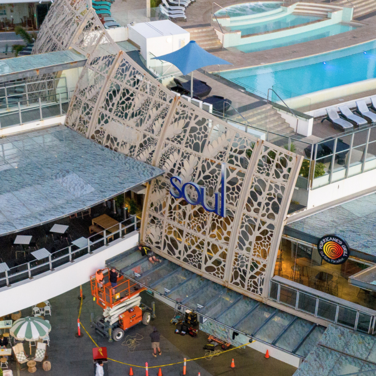Ceramic-printed glass roof panels installed at Soul Surfers Paradise, featuring overhead laminated toughened glass canopies that enhance modern commercial architecture and provide weather protection.