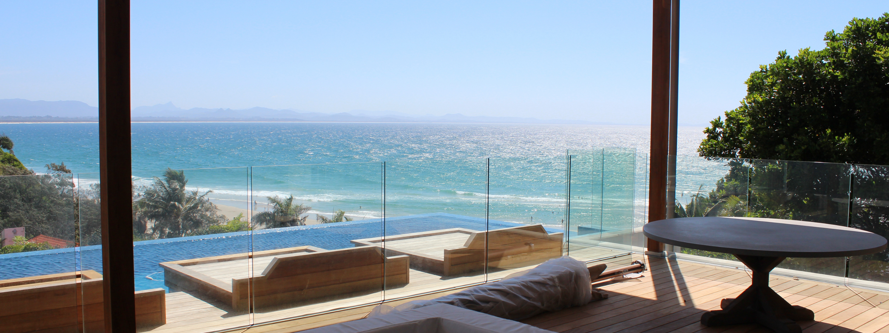 Outdoor living with Polystrong Glass Balustrading on the Gold Coast