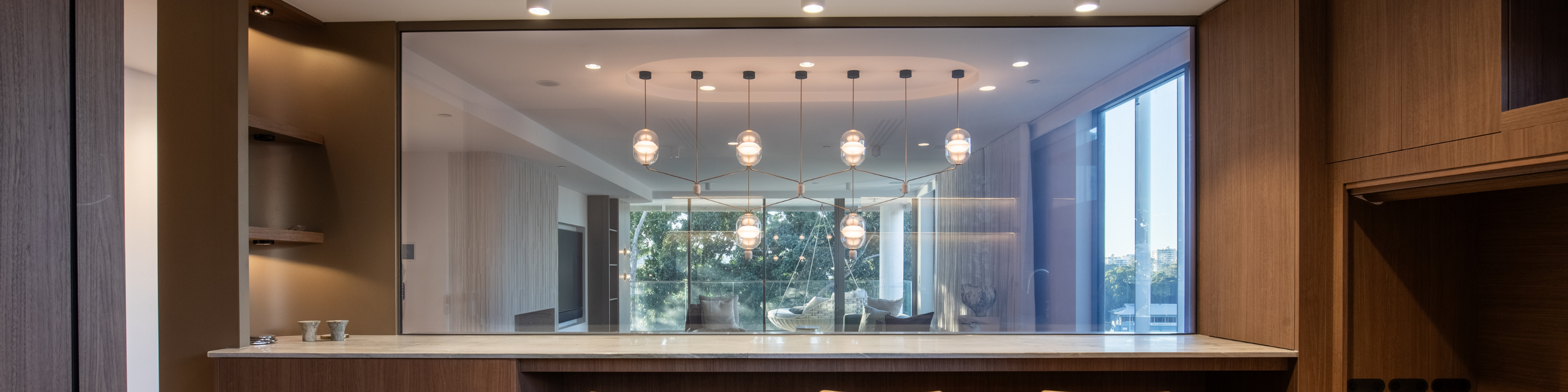 Switching glass between a kitchen and living area