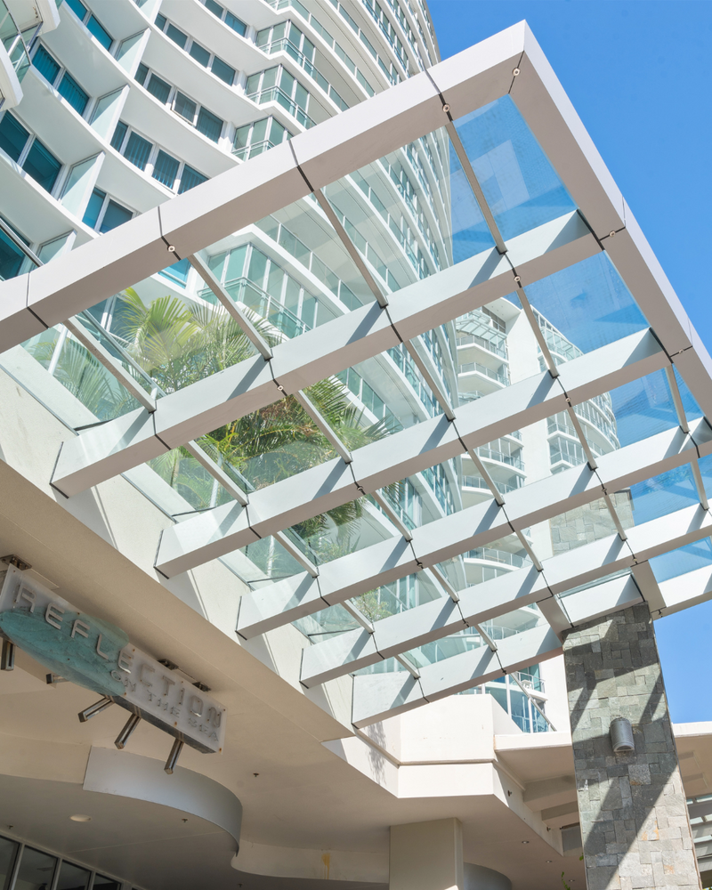 Structural laminated glass in an overhead application at a commercial building