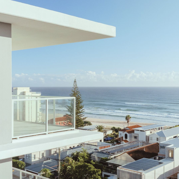 Fixed switchable laminated glass panel creating privacy between bathroom and bedroom in Palm Beach home