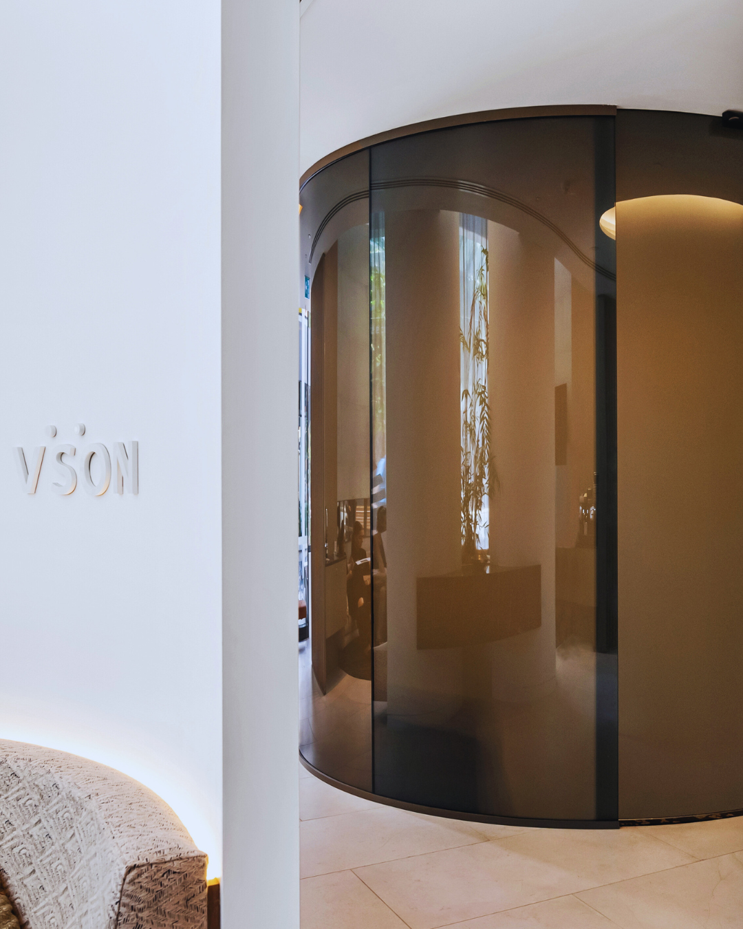 Curved switch glass turned off in a consultation room.