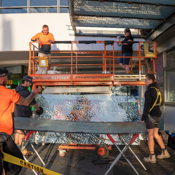 Soul building in Surfers Paradise showcasing ceramic-printed glass canopy panels, modern façade design, and commercial overhead glazing installation.